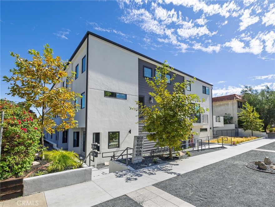 A True Gem of San Pedro! This one-year-old, modern architect-designed front unit in a 6 unit townhouse complex lives like a single-family residence. Located minutes from the ocean in Vista Del Oro and a short walk to Averill Park, it offers nearly 2,000 sq. ft. of modern living, filled with lots of natural light and palm tree views.



Upgrades include premium stainless steel smart appliances, quartz countertops, luxury vinyl plank flooring, recessed LED lighting, hallway skylights, tinted windows, luxury touch-less faucets, a fire sprinkler system, newly installed premium roller shades, and it comes with with high-end washer and dryer set. The open-concept kitchen and living area flow seamlessly to a large private patio—perfect for entertaining or barbecuing, and includes an additional front-side balcony. The home is also equipped with a wired high-speed Ethernet network, ideal for remote work, or streaming.



The private, finished tandem two-car garage includes an EV charging outlet, polished concrete floors, a utility sink, and custom shelving, with natural light from a side window—providing plenty of storage and the perfect setup for a workshop.



This home is close to the Pacific Ocean, Cabrillo Beach, shopping, dining, and the vibrant San Pedro arts community. Just minutes from the upcoming West Harbor waterfront with its amphitheater, Ferris wheel, and world-class events.



Don’t miss this turnkey home, offering the best of modern and coastal living. 



See Supplement for complete Floor Plan.
