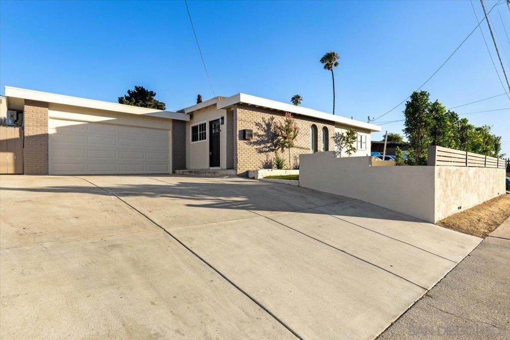 Modern Spanish-style single-story 5 bed, 3 bath home in Chula Vista featuring two spacious primary suites - perfect for multigenerational living or extended stays. One suite is privately located on the far side of the home, offering potential for an ADU conversion. The stylish kitchen boasts custom succulent green shaker cabinets, stainless steel appliances, and beautiful quartz countertops. The inviting living room features charming wood beam ceilings and a custom built-in hutch for added storage. Enjoy year-round comfort with central heat and multiple mini-split AC units. Additional upgrades include updated plumbing. Located just minutes from the new Bayfront Gaylord Pacific Resort & Convention Center, and scenic waterfront—this home has it all!