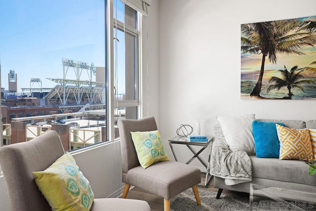 The ultimate Gaslamp Quarter residence awaits you at Trellis! Move-in ready this bright and spacious condo with east-facing views on the 9th floor boasts brand new vinyl plank flooring throughout, fresh paint and a desirable split bedroom floorplan, providing privacy and comfort. The open-concept kitchen is a chef’s delight with stainless appliances, granite countertops, and extensive cabinetry, all under by the warm glow of under-cabinet and recessed lighting. You will love the private balcony with peek views of iconic Petco Park & Coronado Bridge and having 2 side-by-side parking spaces. Nestled in the vibrant Gaslamp Quarter, located conveniently between the Marina District and East Village, this condo offers an unbeatable location. Discover the ultimate in Downtown living—perfect for those who appreciate style, convenience, and a lively urban atmosphere. Trellis is located on the northeast corner of Fifth Avenue and K Street in Downtown’s dynamic Gaslamp Quarter. Amenities include a common entertainment courtyard, bbq’s and a rec room. Residents will enjoy four high-speed elevators and a myriad of retailers on the ground floor only steps away. Welcome home!