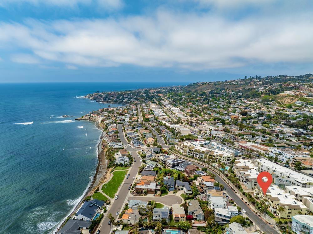 Premier West-Facing Ocean View Residence – Rarely Available!! Welcome to one of Seahaus’s most sought-after residences — a stunning west-facing unit on the convenient first floor, rarely available for sale. This home offers serene Pacific Ocean views from a private patio, perfect for enjoying your morning coffee in peaceful surroundings. Ideally located in the heart of Bird Rock, you’re just steps away from vibrant shops, acclaimed restaurants, and scenic beach paths — perfect for evening strolls and social outings. This upgraded, single-level open floor plan features spacious living areas filled with natural light from large windows. Highlights include generous bedrooms, an expansive primary bathroom, and a large walk-in closet. A flexible bonus room serves perfectly as a third bedroom, home office, or cozy den, with fire place, to enhance the ambience. The gourmet kitchen and bathrooms have been tastefully upgraded. You’ll also appreciate the convenience of a large, separate laundry room and ample storage throughout. Experience the best of coastal living in this vibrant beachside neighborhood. HOA Fee covers: BBQ, Clubhouse/Rec Room, Exercise Room, Pet Restrictions, Pool, Spa/Hot Tub