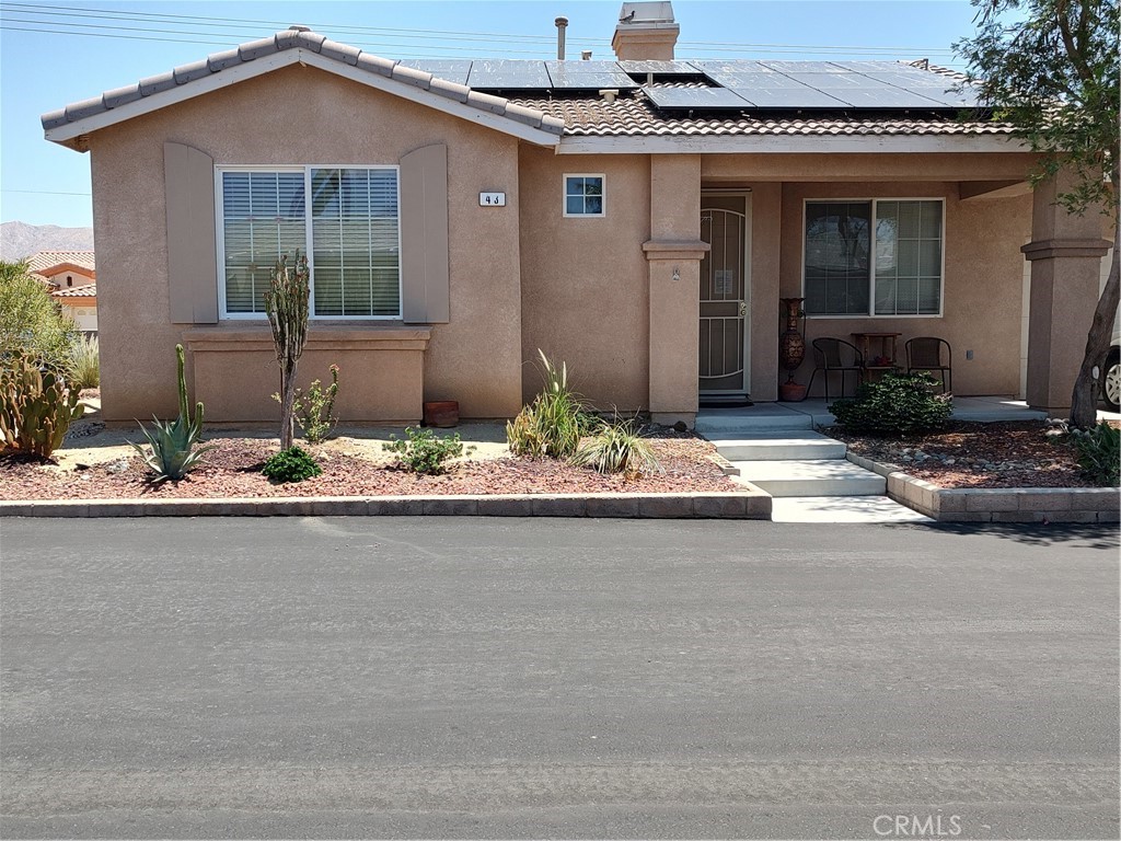 Retire and Enjoy... Affordable/ Solar Home. You own the land. This roomy home is a 2 Bedroom/ 2 Bathroom with garage. Desert Williows is a gated 55+ community. Has pools, clubhouse and many other amenities. The home is open and inviting. Fireplace is in the living room.Outdoorback yard  Patio area with block wall can Party and entertain your family and friends..  views are panoramic add with Gorgeous Mountain Views of San Jacinto/ San Gorgonio. The home is located with in minutes of Palm Springs,California where you can wine and dine at some of the best restaurants. Near Casino's for FUN TIMES. Love to dance this area has some of the best live Bands venues for Music and night life in the desert area. Got your  Game on to Golf many worlds class golf courses to choose from. Nothing but the best....AGENTS, Please be sure to place on your show list to your buyers.