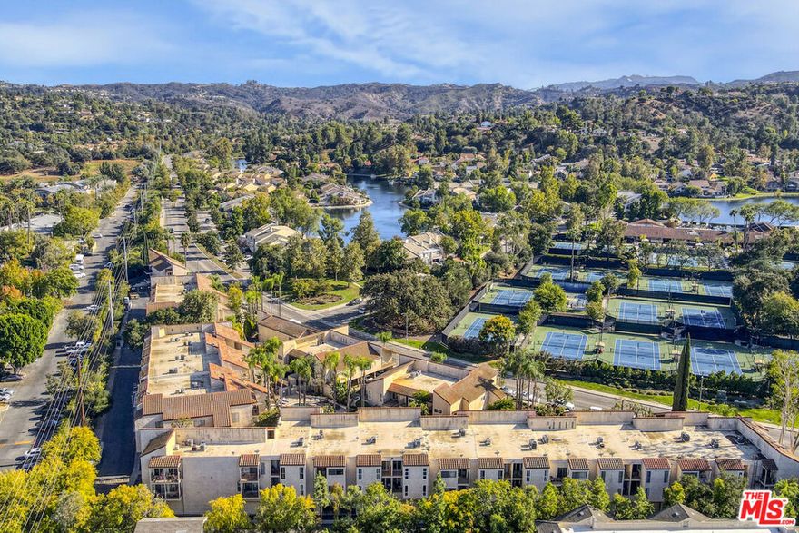 Welcome to your peaceful retreat in one of Calabasas' most sought-after communities! This top-floor, single-level 3-bedroom, 2-bath condo offers a perfect blend of comfort, style, and convenience, all within minutes to the best of Calabasas living. Step through your private gated front entry patio and into a bright, open living space featuring vaulted ceilings and an airy floor plan that feels both spacious and inviting. The modern kitchen includes granite countertops, a breakfast bar, stainless steel appliances, and plenty of cabinet space, seamlessly connecting to the dining area, ideal for entertaining or family meals. The primary suite is a relaxing escape with generous closet space, an en-suite bathroom with a walk-in shower, and a private balcony overlooking the serene rear landscaping. Two additional bedrooms offer great flexibility for guests, a home office, or creative space, with a full second bathroom conveniently located nearby. Additional highlights include an in-unit stackable washer/dryer, two garage parking spaces with huge extra storage unit, and community amenities like a heated pool and spa. Enjoy exclusive access to Calabasas Lake just across the street, and take advantage of the nearby Calabasas Swim & Tennis Center, Farmers Market, The Commons, and Old Town Calabasas, all just minutes away. Located within the award-winning Las Virgenes Unified School District, this condo truly has it all: location, lifestyle, and charm.