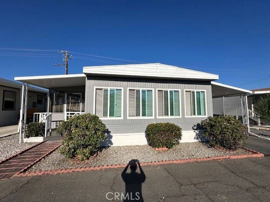 55+ Scenic, Securely gated, Community of Casa Del Rey. This 2Bed. 2 Bth. is a complete remodel with all new flooring, paint, carpeting, white appliances with a refrigerator included. All new counter tops, newly sealed tub/shower and walk in shower. All new faucets and lighting with ceiling fan in the living room. Dual pane windows and a beautiful view of the Idyllwild mountains from your living room. There is a enclosed, covered, screened in front porch with new carpeting. This home is move-in ready and owner will finance to qualified buyers. The Park offers has two clubhouses, swimming pools, enclosed jacuzzi, TV room, conference room, exercise room, barbecue area and more. Affordable park rent of $689.