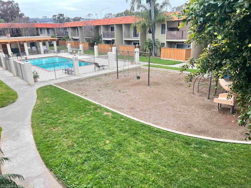 Welcome to this bright and move-in ready 2 bedroom, 2 bath gated condo. This is a perfect blend of comfort, convenience, and value. Located on the second floor and fully air-conditioned, this home features fresh paint, stylish tile and laminate wood flooring, and a functional layout ideal for everyday living. The kitchen is equipped with an electric stove/oven, dishwasher, and built-in microwave, and flows seamlessly into the dining area for easy entertaining. The spacious master suite offers a walk-in closet, while the second bedroom features a mirrored wardrobe and access to ample linen and storage cabinets throughout. Enjoy your morning coffee or evening breeze from the private balcony, overlooking a beautifully landscaped courtyard with palm trees, green space, and a sparkling community pool. The gated complex provides covered parking, well maintained grounds and a true sense of community. Water, trash, and sewer are included in the HOA, making this home both comfortable and cost-efficient. Centrally located with easy freeway access to I-8, Hwy 125, and local shopping and restaurants, this is the ideal home base for San Diego living.  Welcome to this bright and move-in ready 2 bedroom, 2 bath gated condo. This is a perfect blend of comfort, convenience, and value. Located on the second floor and fully air-conditioned, this home features fresh paint, stylish tile and laminate wood flooring, and a functional layout ideal for everyday living. The kitchen is equipped with an electric stove/oven, dishwasher, and built-in microwave, and flows seamlessly into the dining area for easy entertaining. The spacious master suite offers a walk-in closet, while the second bedroom features a mirrored wardrobe and access to ample linen and storage cabinets throughout. Enjoy your morning coffee or evening breeze from the private balcony, overlooking a beautifully landscaped courtyard with palm trees, green space, and a sparkling community pool. The gated complex provides covered parking, well maintained grounds and a true sense of community. Water, trash, and sewer are included in the HOA, making this home both comfortable and cost-efficient. Centrally located with easy freeway access to I-8, Hwy 125, and local shopping and restaurants, this is the ideal home base for San Diego living.