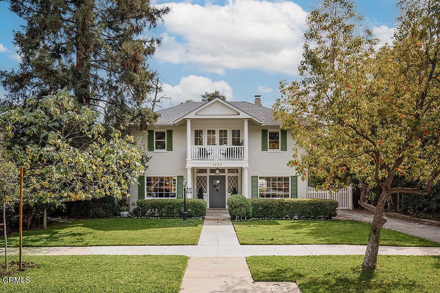 This classic 1910 Southern Georgian Colonial with 4 bedrooms and 2 bathrooms is a standout in Pasadena's northeast Jefferson Park, Pasadena Heights neighborhood. With hardwood floors throughout, the home boasts a welcoming formal entry area with an original two-sided staircase and unique banister beckoning you upstairs.To the entry's left a traditional living room with a large front window, fireplace and built-ins. To the right of the entry an oversized dining room with stately charm. Through the dining room discover a cheery green and recently updated kitchen with marble countertops and backsplash, stainless steel appliances and large under-mounted basin sink with ample lighting and a unique pass-through back to the dining room. Just off the kitchen a separate breakfast room with French doors provides an abundance of light and access to the backyard while also allowing you to round back to the living room or quickly upstairs. Beyond the kitchen and breakfast room find a secondary bathroom and laundry-mudroom combo.Upon ascending the stairs a large picture window greets you at the top with tranquil views of the backyard. Turn to discover an expansive second-floor landing with built-in bookcases. This mezzanine-like space could double as a den, library, office, retreat or media space. Off this bonus area find 4 bedrooms and an updated full bathroom--don't miss the amazing front balcony--an ideal place to enjoy morning coffee or evening cocktails while surveying community happenings from your high-up perch.The over 9,000 square foot lot offers a variety of fruit trees and garden areas--not to mention your own stoic redwood that you can admire from your front yard and porch.The home's attic and sizable basement with exterior access offers ample storage--along with an oversized two-car garage with front or rear alley entry--a rare feature for Pasadena homes.Own your own piece of Pasadena heritage in this incredible, fun and inviting neighborhood just moments from a variant of city and recreational activities. 1660 Las Lunas welcomes you home with every return.
