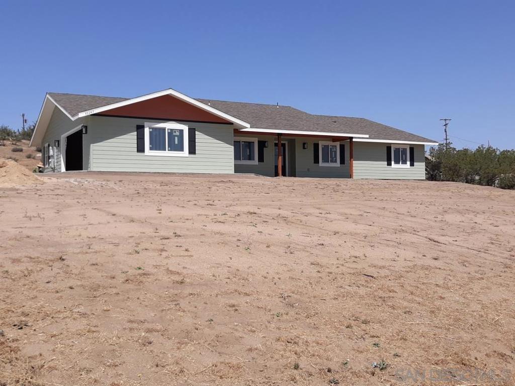 CUSTOM NEW CONSTRUCTION! Welcome to your brand new 4bed/2.5bath + bonus room and LAKE VIEWS, 2,299 sqft Ranch style home with Solar and energy efficient Anderson windows built on a premium 2.65 acres lot with views, space for barn, horses, guest house, etc. Close to main entrance but off major roads for less "dirt eating". Master suite has large custom 6x6 tiled shower. Open concept Great room living area with beautiful barn doors at the bonus room, granite counters, soft closing cabinets, stainless-steel appliances, custom faux wood beam and crown moldings. Massive Laundry with a half bath that doubles as mud room. Walk in pantry with stylish glass pantry door. A house fan to circulate and vent. Bonus room near entry for office, kids play room, secondary family room or whatever you choose. Oversized 677 sqft fully finished and insulated garage provides plenty of room for work shop area or storage along with vehicles and wired for electric car charging. Enjoy views of the lake and mountains with 433 sqft of covered patio in front and back. Great well output above minimum standards. Built to latest fire and energy codes. Fire department located within the community. Lots of room on spacious and private lot for multiple cars, RVs/Trailers, toys. Home Features highly efficient Heating and A/C. Community offers a private lake, Professionally maintained horse arena, pool, basketball and volleyball courts, pump bike track, playground and private airstrip as well as plenty of hiking/riding trails.