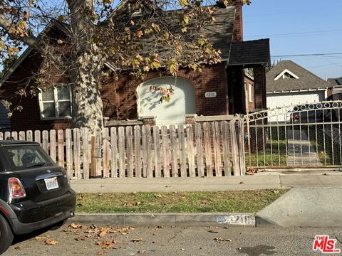 Photo of 1218 N Spring Avenue, Compton, CA 90221 (MLS # 26634639)