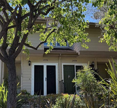 Photo of 24376 Larchmont Court, Laguna Hills, CA 92653 (MLS # OC26062986)