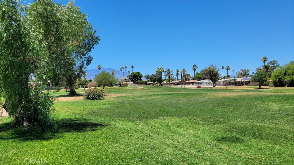 Absolutely Gorgeous Palm Desert Single Story 3 Bedroom Home! This Perfect Home in the Highly Desired Palm Desert Country Club on the Golf Course on Minnesota Ave does not come on the market often! Three Bedrooms, 2 Bathrooms with an Open Spacious Floorplan. Immaculate, Light and Bright! Wonderful Custom Upgrades & Remodel Work includes; Paint, Fully Remodeled Open Kitchen with lovely Butcher Block Island and Garden Window, Appliances, Fixtures, Remodeled Bathrooms, Recessed Lighting, Ceiling Fans, Newer Efficient Heating & A/C system and Luxury Porcelain Tile Flooring in the home is just Beautiful. Perfect Walk-in Pantry, Separate Laundry Room and Private Enclosed Patio are right off the Kitchen. The Primary Suite and other 2 bedrooms are wonderful. The One Car Attached Garage is great with space for storage and plenty of parking in the front driveway. Enjoy your Beautiful large back yard and your low maintenance garden front yard. Your backyard opens to the Palm Desert Golf Course with Beautiful Views of the Santa Rosa & San Jacinto Mountains. And your yard is large enough to put in a pool if desired! Both the front and backyards can add to your wonderful outside living space. The Location is prime on Minnesota Ave with Mountain Views and beautiful walking in the Country Club neighborhood. This is your opportunity to own this beauty in the Palm Desert Country Club, PDCC. This Highly Desired Community offers so much to Enjoy whatever time of year it is! Two lovely Pools (1 heated), Heated Spa, Larger Event Hall with meeting rooms, Joe Mann Park & Rose Garden, playground and dog park. Enjoy the the wonderful Palm Desert, La Quinta communities for Shopping, Restaurants, Hiking, Art Galleries and Golf and close to Freeways... Experience 18 holes here at the Palm Desert Country Club Golf Course, one of the best public golf courses in Coachella Valley. Stop by and see the Beautiful Neighborhood! Welcome Home!