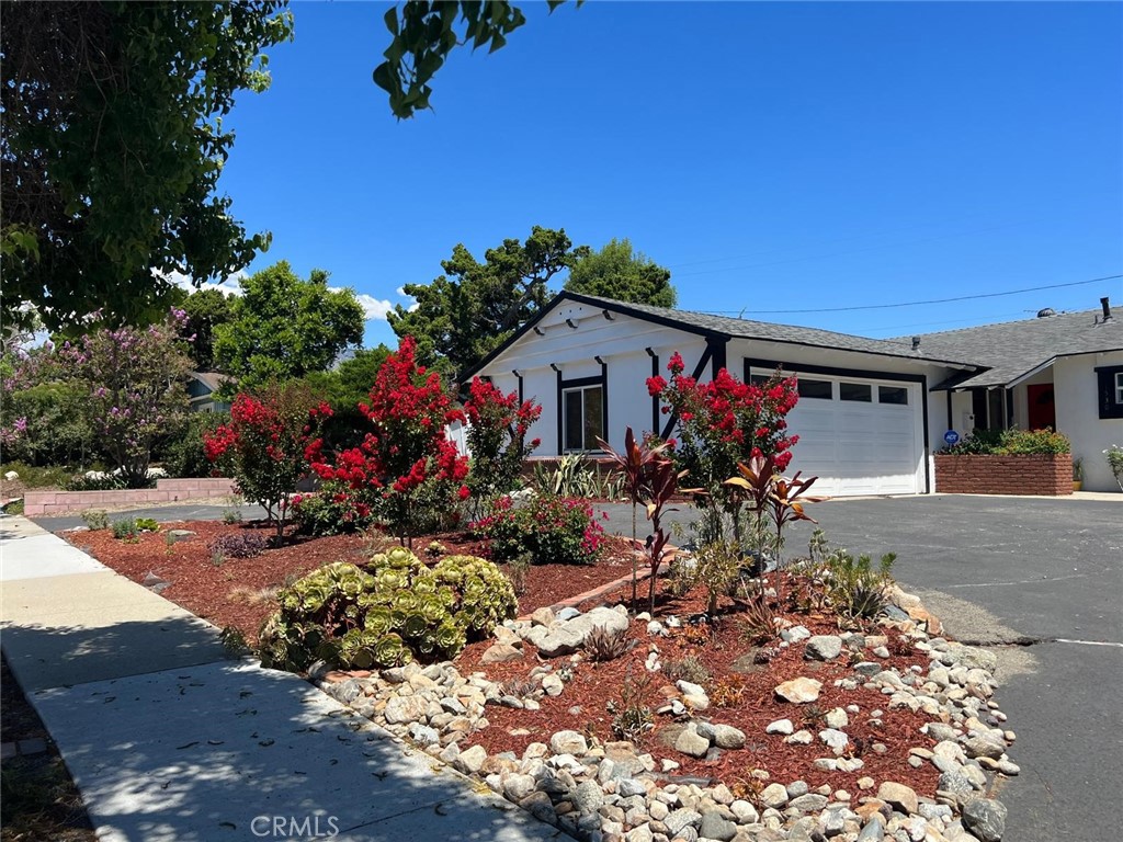 Lovingly cared for residence and a unique backyard with Avocado, Apricot, Peach, Persimmon, Orange and Apple Trees as well as a variety of Berry Bushes. The backyard has strategically placed raised planters for seasonal planting. The AC and Heating systems including ducting were replaced in 2021 and the sewer line in 2022. The owner is completing the combination of the living and dining area into an open concept living area as well as other upgrades. Hardwood floors throughout and a lovely addition, not included in the square footage, makes this home full of natural light a wonderful relaxing retreat.