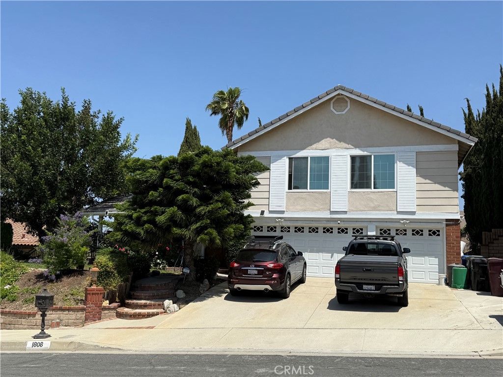 Welcome to this charming home in the heart of Rowland Heights. This inviting two-story residence features 4 spacious bedrooms and 3 bathrooms. Upon entering, you’ll be greeted by a bright and open living room and dining area, perfect for entertaining. The cozy family room, complete with a fireplace, is ideally situated next to the large kitchen, creating a warm and welcoming space for family gatherings. A sliding door leads to the backyard, where you'll find a refreshing pool—ideal for cooling off during hot summer days.
The main floor also includes a convenient bedroom and bathroom, offering flexibility for guests or multi-generational living. Upstairs, a generously sized bonus room provides endless possibilities, whether as a second family room, playroom, or home office. The master suite boasts a spacious bedroom and bathroom with separate soak tub and walk-in shower.
With easy access to the garage next to the laundry room, this home offers both functionality and comfort. Located just moments away from numerous supermarkets, restaurants, and department stores. With convenient access to highways 60, 605, and 57, this home combines convenience and tranquility. Drive minutes away from Cal State Fullerton and Mount Sac College. Don't miss the opportunity to make it yours!