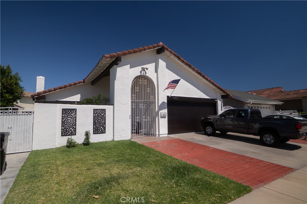 We proudly present this Gorgeous two-story pool home in one of the most desired neighborhoods of Cerritos. The property sits across the street from Tetzlaff Jr. High School and is Conveniently located near the Los Cerritos Center shopping mall, restaurants, parks, and schools. Built in 1970, this home features a spacious living room with high ceilings, open kitchen with lots of cabinet space and a dining area with direct backyard access where you can enjoy your very own private pool! This Home has 4 bedrooms, 2 baths (1 bedroom 1 bath downstairs and 3 bedroom 1 bath upstairs) Central A/C and Heat and an attached 2 car Garage. Come take a look!