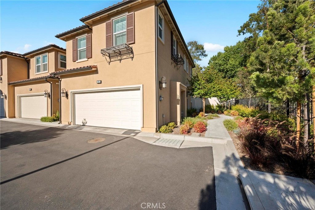 Luxurious End-Unit Townhome with Designer Upgrades & Energy Efficiency! Welcome to this exceptional, brand-new modern townhome tucked away in a quiet, end-of-community location in the heart of Simi Valley. This end-unit offers privacy, open views, and the perfect balance of contemporary design, premium upgrades, and eco-conscious living. Overlooking a serene park, walking path, and natural wash, this Warmington-built home is crafted with high-quality materials and finishes throughout both levels. Step inside and be welcomed by vaulted ceilings, luxury vinyl plank flooring, and an open floor plan flooded with natural light. The spacious living room features a floating electric fireplace, custom shutters, and a beautiful ceiling fan, creating a cozy and inviting space for gatherings. The gourmet kitchen is a chef’s dream, showcasing quartz countertops, stainless steel LG appliances (2 years old), modern cabinetry, and recessed lighting. It flows seamlessly into the dining area and out to a large private backyard and side yard, ideal for outdoor entertaining. The home also features a finished 2-car garage, and a decent-sized front yard—rare for townhomes. Upstairs, all three bedrooms are generously sized with upgraded carpeting, and the primary suite includes a spa-like bathroom with a large walk-in shower, dual high vanities, and a walk-in closet. Also upstairs: convenient laundry area and smart-home features like EERO WiFi, Ring security system, and energy-efficient double-pane windows. This townhome is built for modern, efficient living:
8 SunPower solar panels – PAID OFF
EV charging station with city permit
Tankless water heater, HVAC, and furnace – all just 2 years old
High baseboards, crown molding, and designer window curtains throughout
With its unbeatable location, modern upgrades, and attention to detail, this is a rare opportunity to own a turnkey, eco-friendly home in one of Simi Valley’s most sought-after communities.
Don’t miss this one-of-a-kind gem—schedule your private tour today!