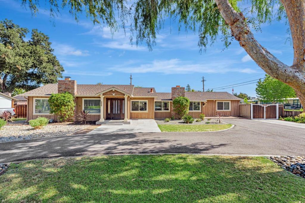 Rare opportunity for a highly coveted street in the prestigious GATES neighborhood of Willow Glen. This single-story home offers three bedrooms and 2.5 bathrooms across 2,142 sq.ft., situated on a 15,000+ sq. ft. corner lot. Enjoy two fireplaces anchoring the spacious living and family rooms w/ permitted kitchen remodel. Move in ready, also excellent opportunity to remodel and build a dream home. Fourth room adds a rare flexibility: use it as a bedroom, office, art studio or gym. Entertain in style in your backyard sanctuary featuring a complete outdoor kitchen, bar, and dedicated entertainment area. Ample Space for RV & boat. The oversized lot provides options for a future potential ADU with endless opportunities for customization and expansion. Ideal for individual buyer looking to remodel, or investor, looking for a coveted lot with two street entrances, Cottle & Koch, avenues. Brokers and broker's Agents do not represent or guarantee the accuracy of the square footage, permitted or unpermitted spaces, lot size/dimensions, or other information concerning the conditions or features of the property. All Buyers are advised to independently verify the accuracy of all information through the appropriate professionals to satisfy themselves and utilize only their own information.