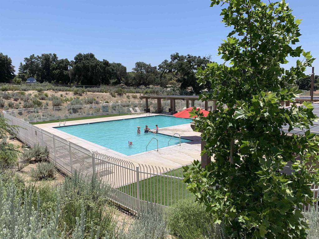 Beautiful single family house nestled in the delightful gated Compo Hill Community. This large open floor plan offers 4 bedrooms, 2 full baths and 2 car garages for your family to grow. The house is light and bright. Granite counter top, tile and vinyl floors. The community offers a sparkling and relaxing pool, basketball courts, RV parking, picnic area, Parks and a play ground for the kids. Close to Lake Modena, hiking trails and many out door activities.