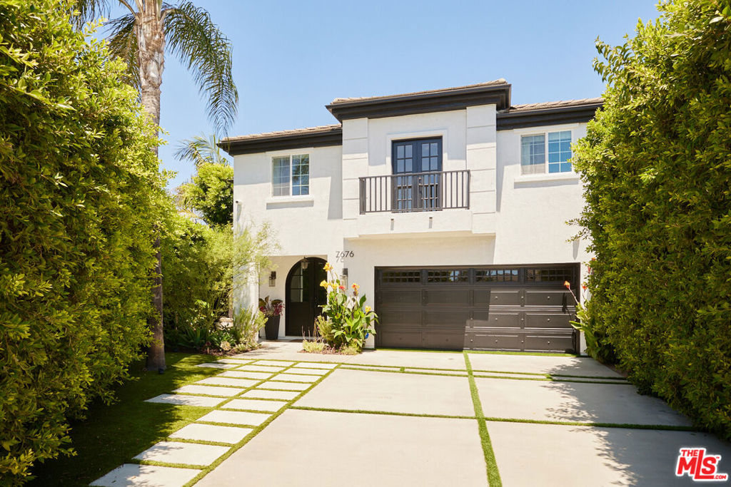 Discover the Pinnacle of Luxury Living at Coldwater Court! Set on the premier lot within the exclusive gated enclave of Coldwater Court, this breathtaking residence is a rare offering of style, sophistication, and serenity. Meticulously reimagined from the ground up, the home blends timeless elegance with modern indulgence, delivering a private resort-style retreat in the heart of North Hollywood.From the moment you arrive, every detail captivates. A brand-new paved driveway and stately iron French entry doors set the tone for what lies within: a showstopping 5-bedroom, 4.5-bath masterpiece designed for those who demand the extraordinary. The open-concept floor plan flows seamlessly from a formal living and dining area to a sun-drenched family room and a chef's dream kitchen, complete with brand-new Thermador appliances and custom cabinetry.Outdoors, your personal sanctuary awaits. Breathtaking landscaping frames a resort-style backyard designed for unforgettable entertaining and tranquil escapes. Multiple fountains, a spiral staircase, and a custom wooden deck with cooling ceiling fans create a dramatic yet serene setting. Indulge in an outdoor shower after a swim, gather around the built-in fire pit under the stars, or simply relax in the whisper of cascading water. The primary suite is pure decadence: new custom closets, and a spa-inspired bath with Carrera marble, a freestanding soaking tub, dual vanities, and a rain shower. Each additional bathroom has been thoughtfully reimagined, including a powder room adorned with Carrera marble and plaster walls. Luxury extends to every corner: a high-tech ADT security system with seven cameras, garage cabinetry enhanced with hand-laid Mexican tiles, and brand-new essentials including water heater, washer, and dryer. Perfectly positioned just moments from the vibrant NoHo Arts District, acclaimed theaters, galleries, and the highly anticipated NoHo West with world-class dining, shopping, and fitness destinations, this home offers not just an address but a lifestyle. Coldwater Court is where luxury, privacy, and design converge. Schedule your private tour today and experience the ultimate in Los Angeles living.