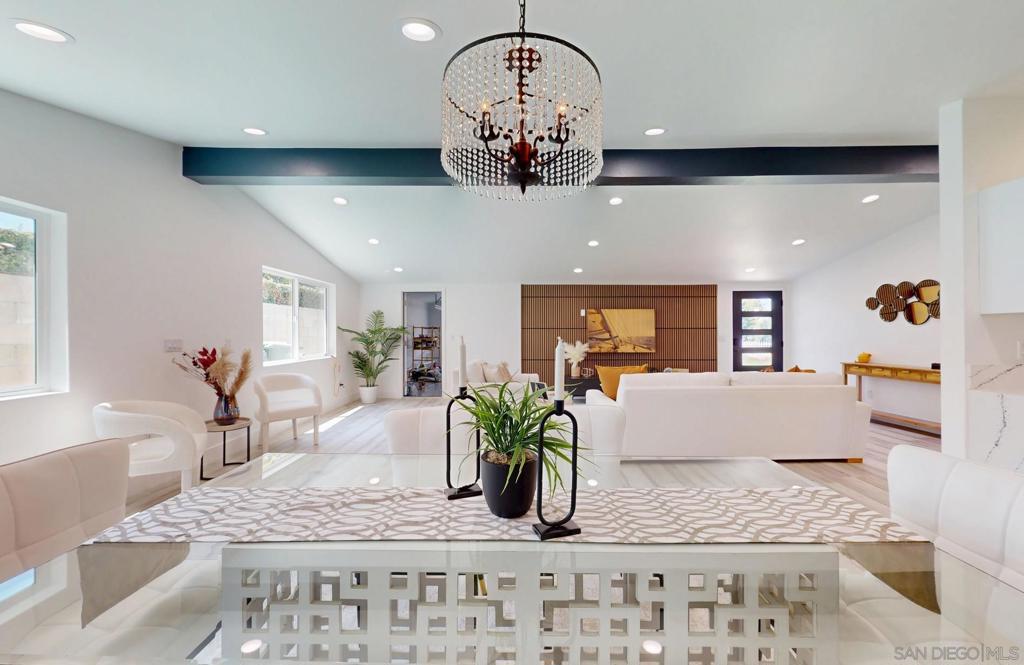 ** Price Reduced ** Welcome to your dream home in the heart of Costa Mesa’s vibrant, nestled in the "City of the Arts"! A beautifully and fully renovated 4-bedroom, 2.5-bath residence offering 1,638 sqft of stylish living on a spacious 8,302 sqft lot. Ideally situated on the West side of Costa Mesa, offering the perfect blend of style, comfort, and coastal convenience. It’s just one block west of Newport Boulevard — a prime location for convenience and lifestyle. *Prime location •Enjoy quick access to the best Orange County has to offer. •Less than 5 minutes to Triangle Square and PCH Highway, home to premier restaurants, trendy bars, boutique shopping, and entertainment hotspots. •Under 10 minutes to the iconic Newport Beach Pier, perfect and ideal for weekend strolls, and beachside dining. * Move-In Ready & Fully Renovated: This home has been rebuilt from the studs up, offering the feel of a brand-new house with every modern upgrade: •Gourmet kitchen featuring sleek quartz waterfall countertops, ideal for hosting friends or preparing your favorite meals. •Bathrooms are fully updated with contemporary designs and fixtures for relaxation and luxury. *All-new systems: •Central AC, tankless water heater, new roof, durable vinyl flooring, all-new dual-panel windows, and fresh interior/exterior paint. •Epoxy-finished garage for a polished, clean look. Future-Ready with ADU Potential - A 1,200 sqft ADU is in the process of obtaining permits, offering endless possibilities for a guest house, or rental income—perfect for savvy buyers looking to maximize their investment.