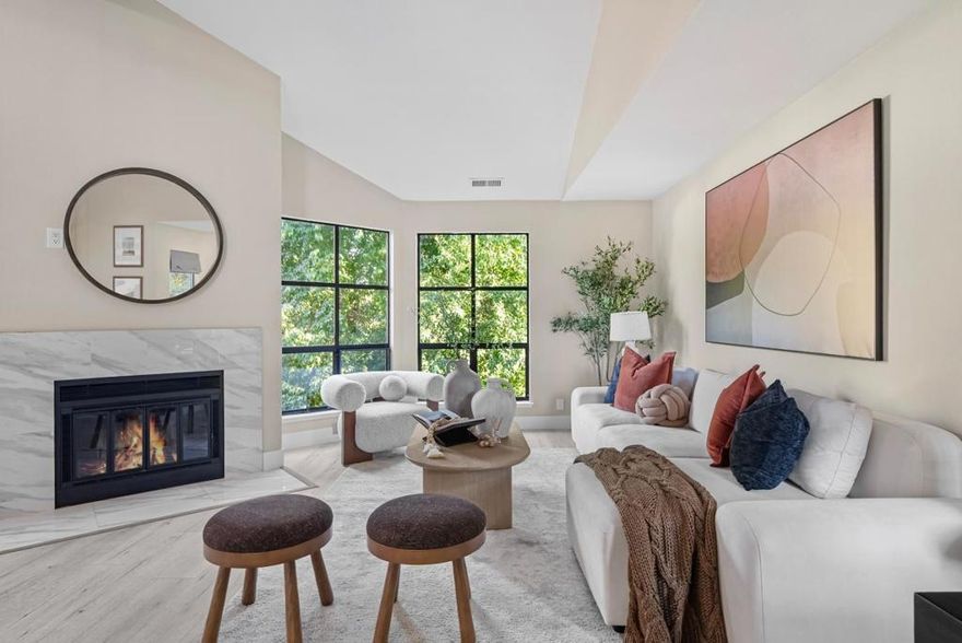 Charming and light-filled, this top-floor 3 Bed / 2 Bath condo is nestled in a quiet, tree-lined 12-unit community in San Jose. Vaulted ceilings and expansive windows fill the home with abundant natural light. A sleek spiral staircase leads to a spacious loft, perfect for use as a home office, media lounge, or flexible third bedroom. The open-concept living and dining areas flow seamlessly to a private balcony framed by mature trees, creating a cozy indoor-outdoor retreat. The kitchen features granite countertops, white cabinetry, stainless steel appliances, and a walk-in pantry with built-in shelving. Both main-level bedrooms offer privacy and comfort, while a large laundry closet accommodates a full-size washer and dryer plus extra storage. A private 1-car garage adds everyday convenience. Ideally located in the heart of Silicon Valley, just minutes from Santana Row, Valley Fair, the Rose Garden, and Caltrain, with easy freeway access. Don't miss this move-in-ready home in one of San Jose's most central and commuter-friendly neighborhoods!