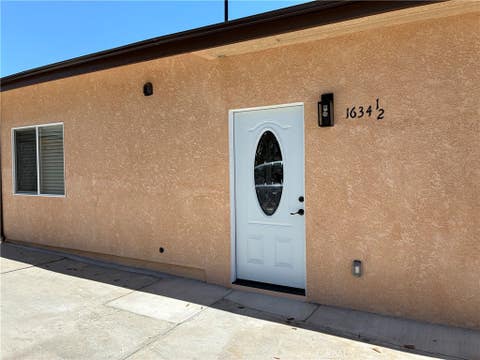 Photo of 1634 1/2 W 214th ST, Los Angeles, CA 90501 (MLS # SB26163602)