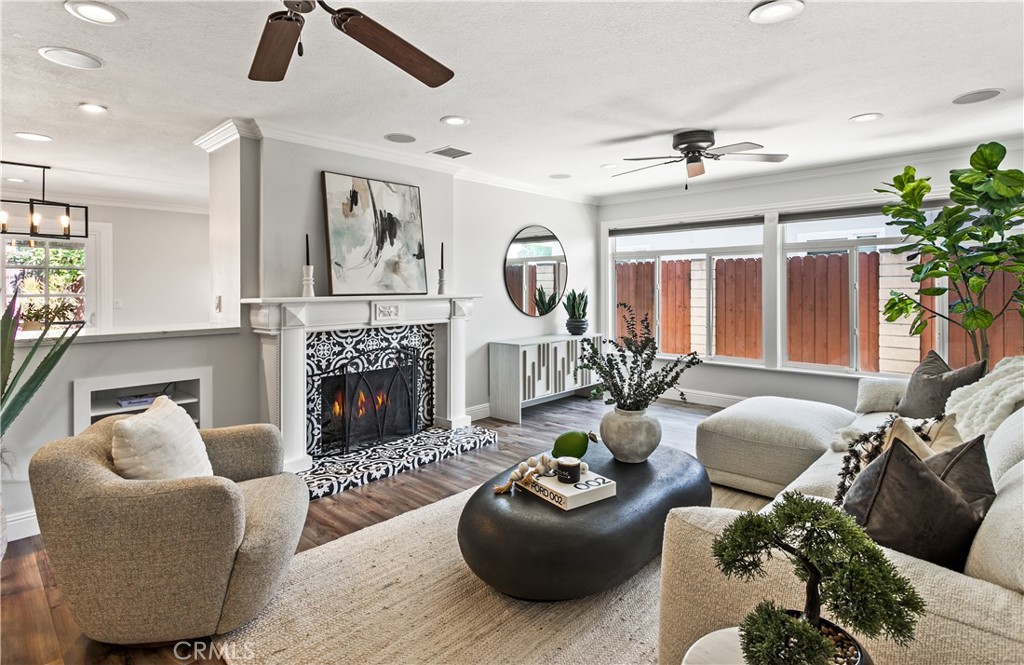 Welcome to 3295 Iowa Street—a single-story Mesa Verde residence originally crafted by Dike & Golegrove, thoughtfully blending comfort, flow, and timeless style. This beautifully updated home showcases an inviting open layout filled with natural light, paired with modern finishes throughout.
At the heart of the home, the remodeled kitchen boasts sleek quartz countertops, a generous island, and premium appliances—perfect for both everyday living and entertaining. The seamless floor plan is enhanced by new vinyl plank flooring, recessed lighting, and expansive windows that create a bright and airy atmosphere.
Step outside to a private backyard oasis featuring a custom pergola, sun-drenched patio spaces, and a fully restored pool with new tile detail. With no neighbors behind you, the setting is both private and quiet—ideal for relaxing or hosting gatherings. Fresh landscaping and newly painted exteriors add curb appeal while providing a serene backdrop for outdoor living. New 2025 roof.
Additional highlights include an attached garage offering ample storage and parking. The home’s prime location places you minutes from shopping, dining, and major freeways, with local schools, parks, and scenic bike trails leading straight to the beach just a short walk away.
Mesa Verde is known for its welcoming community spirit—complete with neighborhood events, festive home decorating, and block parties that bring everyone together.
Experience the best of Costa Mesa living in this rare opportunity. Don’t miss your chance to call 3295 Iowa Street home.