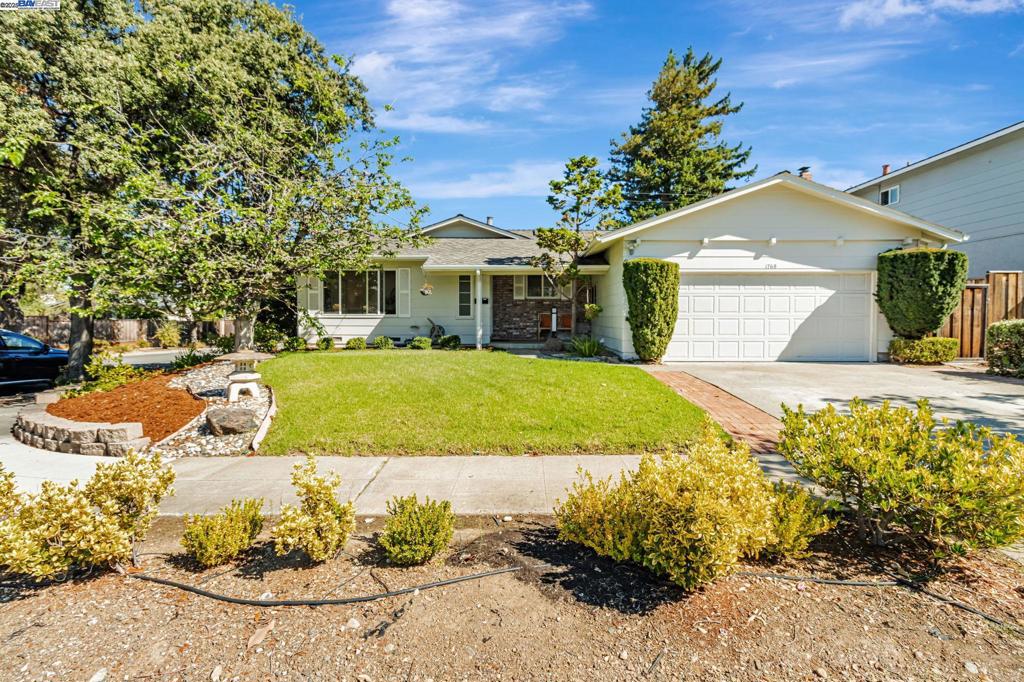 Set on a quiet court near the Los Altos and Cupertino borders with Top Cupertino Schools - West Valley Elem., Cupertino Middle, & Homestead High This single-level, spacious ~1,625 sq ft home offers 4 bedrooms and 2 baths on a 6,565 sq ft lot—minutes to Apple, Google, LinkedIn, parks, shops, and major routes. Commuter-friendly with quick access to Hwy 85, I-280, and SR-237. Inside, fresh interior paint brightens refinished hardwood floors and recessed lighting. You’ll have both a living room and a separate family room—easy spaces to gather, work, or unwind. The kitchen features granite counters and custom maple cabinetry and opens to the family room so cooking and conversation stay connected. The primary suite feels private, with a dual-pane slider to the backyard—morning coffee is a few steps away. Outdoors, the landscaping is mature and low-maintenance, with a welcoming front porch for sunrise or evening chats. Attached 2-car garage plus extra parking add everyday practicality. Served by West Valley Elementary, Cupertino Middle, and Homestead High (buyer to verify). If you like single-story living, a calm court location, and a quick commute, this one checks the right boxes.