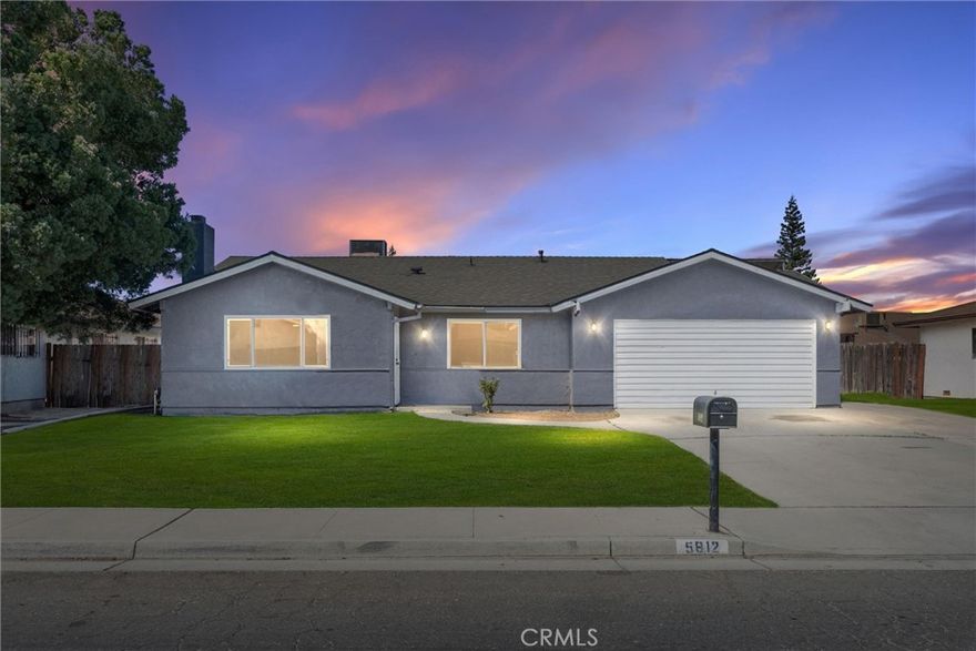 Welcome to this fully upgraded Southwest Bakersfield gem! Featuring a newer roof, windows, and stylish laminate flooring throughout, this home is move-in ready and full of modern touches. The primary suite offers double closets and a refreshed bathroom, while the spacious living room is highlighted by recessed lighting, a ceiling fan, and a brand-new electric fireplace for cozy evenings at home. The kitchen shines with granite counters, stainless steel appliances, and a picture window overlooking the front yard bringing in plenty of natural light. Step outside to a backyard built for entertaining, with an oversized covered patio and tons of space to create your dream outdoor retreat, whether it's a pool, garden, or BBQ area. Located close to CSUB, schools, shopping, and dining, this home blends comfort, convenience, and lifestyle.