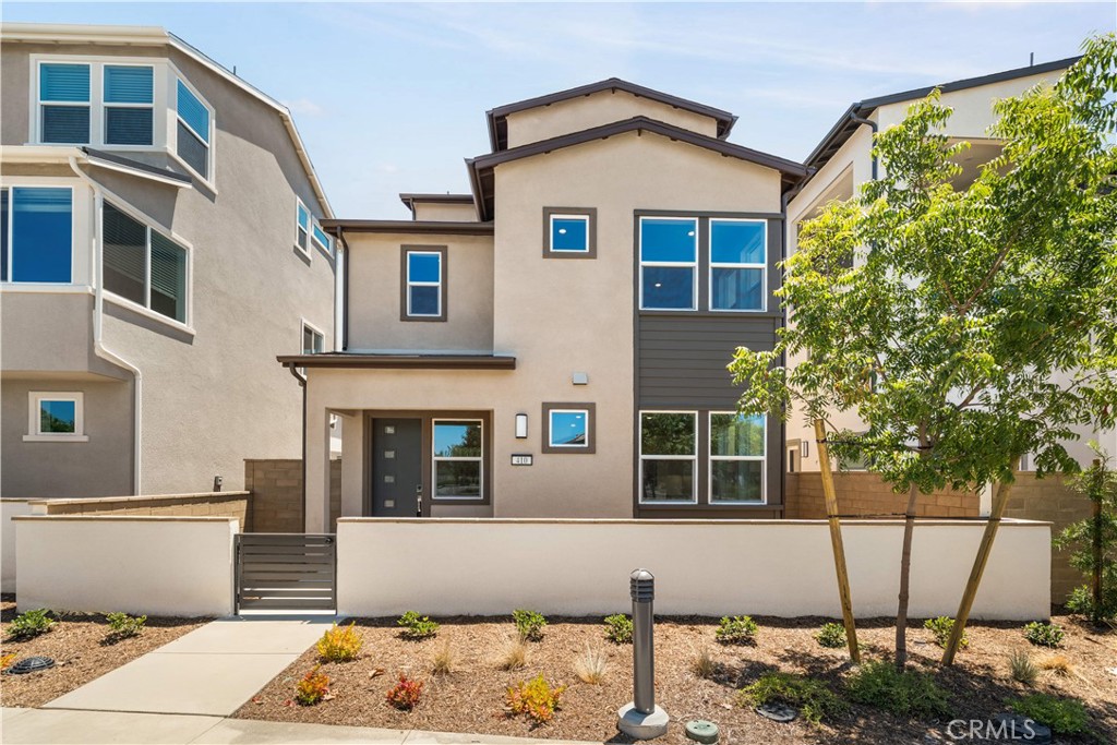 Live the Upgrade! Immaculate Lennar-Built Home in Great Park's Orion 2 Model (Irvine School District), Step into this pristine, fully upgraded 4-bed, 3.5-bath detached condo in Great Park's sought-after Orion 2. Convince Floor Plan with Kitchen on the First Level, a gourmet kitchen (quartz counters, stainless steel, large island) opens to bright living/dining areas and your private patio. Retreat upstairs to a spacious primary suite (walk-in closet, dual vanity bath), two secondary bedrooms, a full bath, and laundry. The top floor is a private oasis—a 4th bedroom with ensuite bath, loft, and patio—perfect for guests or family. Move-In Perks You'll Love: Energy-saving with leased SOLAR PANELS, brand-new fridge/washer/dryer, upgraded new window coverings wood shutters, and easy maintenance Landscaping private yard. Close By Top Irvine schools in the same community, shopping, dining, and the Great Park Parks are moments away. Enjoy resort-style pools, parks & sports courts. This premium-upgraded, move-in-ready home delivers exceptional Great Park living. Must See!!
