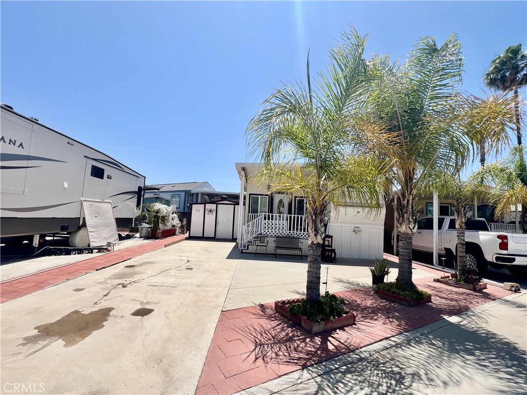 OWN YOUR LOT! Desired Mt Shadows RV Resort Gated 55+ Senior Community. Oversized "A" Lot Approx 2,178 Sq Ft. Affordable, Cute & Cozy 1989 Nomad Fifth Wheel With Enclosed Patio Room Attached Currently Used As A Living/Dining Room Combo. Enter From The Front Porch To The Large Living Room With Access To the Backyard Patio. Kitchen With Light Cabinetry, Step Up To A Couch Area, Bathroom Has Shower/Tub Combo & Commode. Bedroom With Mirrored Wardrobe Closet. Two Clubhouses To Choose From Close To Clubhouse Two With Lots Of Amenities Including Heated Salt Water Pool, Spas, Billiards, Shuffle Board, Picnic Areas, Large Community Kitchens, Exercise Rooms, Restrooms And Showers, Laundry Rooms, Horse Shoe Pit, Ping Pong Tables, Corn Hole And More. LOW TAXES & HOA FEES Of 243.65 X Month Includes Water, Sewer, Trash, Basic Cable & Internet. Retirement At It's Finest!