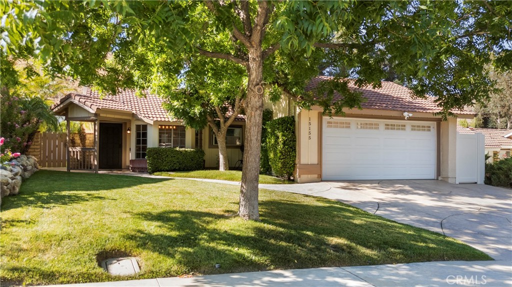 Cozy and beautifully kept 2-bedroom, 2-bath home in Canyon Country. This charming property offers a warm living space, bright kitchen, and peaceful outdoor area—perfect for relaxing or entertaining additional the house offers a bedroom/office space and also have a Tesla charger in the garage A true gem in a quiet, convenient neighborhood!
