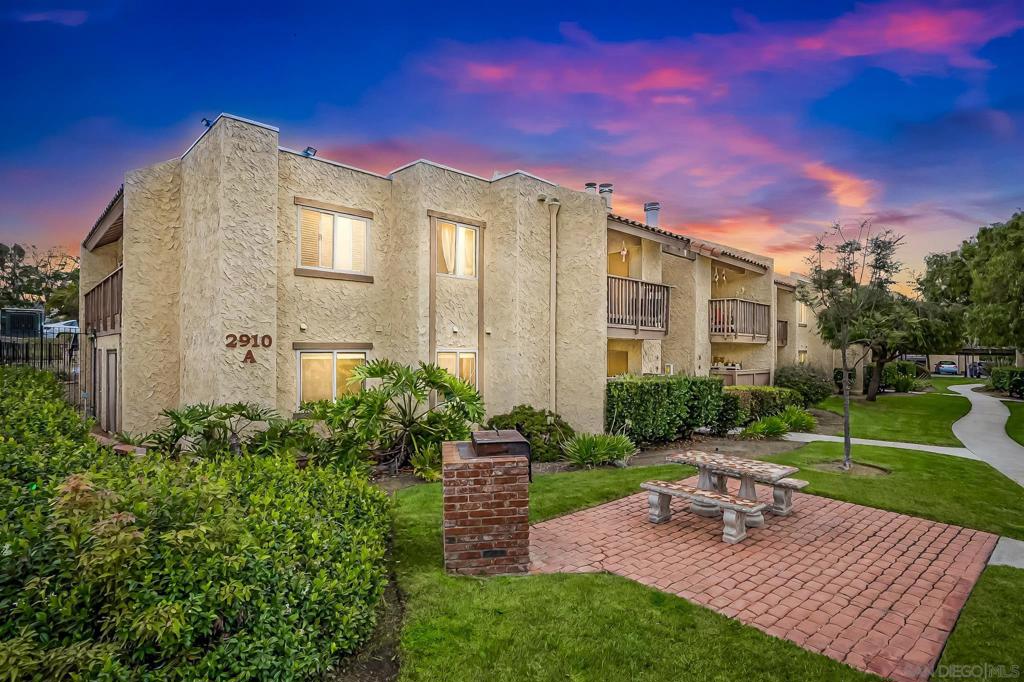 Welcome to this beautifully renovated 2-bedroom, 2-bathroom ground-level condo located on the peaceful outskirts of Bonita. This move-in-ready home features stylish tile flooring throughout, fresh interior paint, recessed lighting, and a cozy fireplace in the living room. The updated kitchen shines with matching stainless steel appliances, quartz countertops, and new cabinetry offering a sleek, modern space for cooking and entertaining. The home also includes a brand-new washer and dryer, two assigned parking spaces, and a private enclosed patio with extra storage. Set within a fully gated community, residents enjoy access to a large grassy area perfect for picnics or walking pets, a full tennis court, and a resort-style swimming pool and spa. This turn-key home blends comfort, style, and convenience.