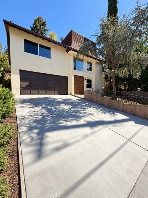 Photo of 5144 Don Pio DR, Woodland Hills, CA 91364 (MLS # CV26226182)