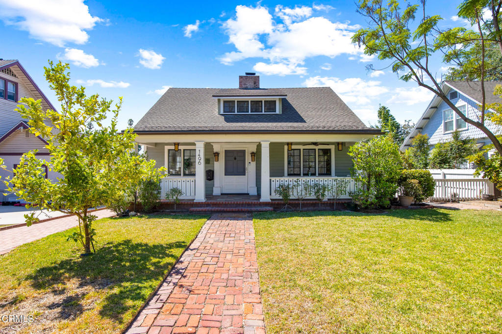 This Pasadena Craftsman home sits on a quiet, tree-lined street with beautiful views of the San Gabriel Mountains, best enjoyed from the spacious front porch or upstairs windows. Inside, a large fireplace anchors the living room, flowing into a separate dining room, a bright eat-in kitchen, and a convenient laundry room. Classic details like pocket doors, hardwood floors, and wainscoting add timeless charm throughout the home, while modern upgrades such as ductless heating and air conditioning, updated appliances, and an EV charger provide for year round comfort. The peaceful backyard provides the perfect spot to relax, entertain, or garden. With close proximity to Old Town Pasadena, the South Lake shopping district, and major transportation, this home combines historic character with modern amenities--an opportunity to own a truly special piece of Pasadena.