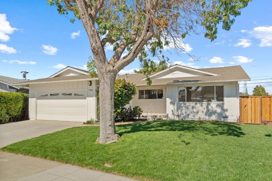 Lovely ranch-style home perfectly nestled on the rarely available Wide Water in the coveted Parkside neighborhood of San Mateo. Designed with an open floor plan, it features a light-filled living and dining room combination, an updated eat-in kitchen with new appliances, and a generous family room with a fireplace and a wall of windows with sliders that open to a covered rear patio and expansive yard with private dock potential. The primary suite offers a spacious closet, elegant bath, and serene water views, while additional highlights include beautiful random plank hardwood floors, a two-car attached garage with workbench and laundry, and a stellar location with minimal traffic near an array of destinations. This home seamlessly combines tranquility, comfort, and rare waterfront living into one extraordinary opportunity.