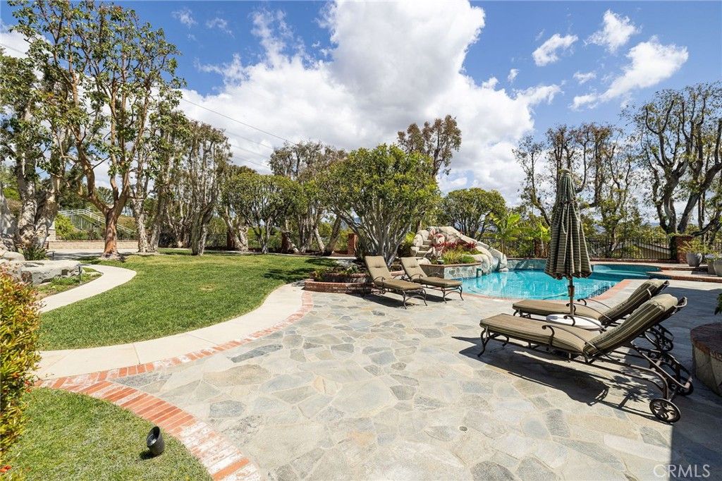 Photo of 25611 Rangewood Road, Laguna Hills, CA 92653 (MLS # OC25124611)