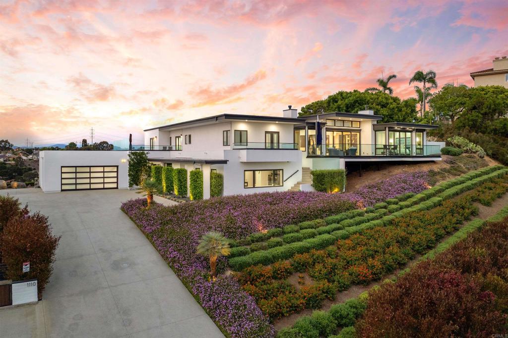 Welcome to this one of a kind custom-built home remodeled by Paul Munsch. This pristine masterpiece exhibits true quality and luxury living, privately situated on a 1.04 acre lot elevated above Del Mar with spectacular views of Lomas Santa Fe Golf Course on one side and an expansive breathtaking whitewater views of the Pacific Ocean on the other. Main living and kitchen includes LaCANTINA aluminum sliding doors which create a versatile indoor/outdoor living, bringing in plenty of natural lighting and ocean breezes. Remote controlled shutters throughout with blackout shutters in the primary bedroom. Kitchen was designed with all high end appliances: Sub-Zero refrigerator and wine refrigerator, Wolf range and hood, Bosch dishwasher with a large walk-in pantry equipped with custom built-in shelves and cabinetry for ample storage, Asko dishwasher, backsplash tile imported from Spain and additional windows for natural lighting. The luxurious primary suite encompasses a cozy fireplace, views of the ocean, private patio, standalone bathtub in master bathroom with walk-in closet and built-in custom cabinetry. This immaculate home also consists of an elevator, custom designed cabinetry throughout by Quality Woodworks Inc., Sonos surround sound, custom high end lighting throughout, a central alarm system with motion sensors, a drip system throughout in order to take impurities out of the water and much more - includes designer finishes and fixtures: Grohe, Kohler, Lacava, Baldwin locks. The well-kept landscaping was designed with low maintenance plants consisting of rare succulents, turf and all decks were professionally waterproofed. In addition, this property contains plans and renderings for an ADU over the garage designed by architect James Chinn. Located conveniently near shopping, dining, a 4 minute drive to the Lomas Santa Fe Country Club and under 10 minute drive to the beach! Home is 3,660 Sq. Ft.; there is an additional 222 Sq. Ft. Gym and 600 Sq. Ft. Garage.