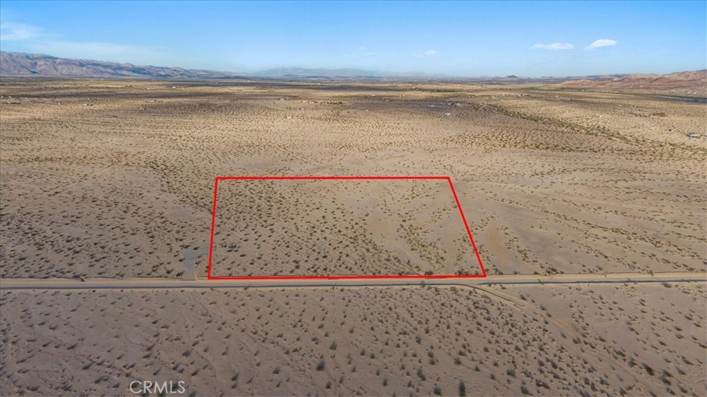 Rare 2.5 acres parcel in 29 Palms with endless potential! Zoned RL, this property is perfect for building a custom Ranch home, adding 2 mobile homes or creating an RV park (permits required). Water well can be added, and a contractor is available to assist the new owner!!!! Located in a peaceful desert setting, this lot offers privacy, space and blank canvas to bring your vision to life!!!!