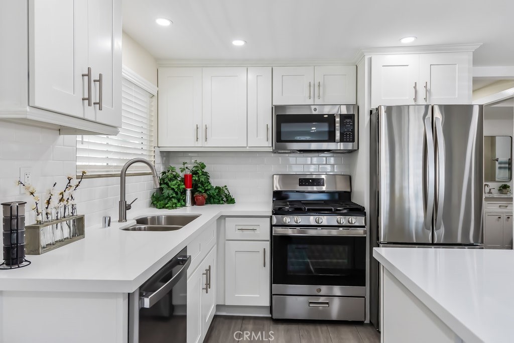 Searching for a home without the Million Dollar Price Tag? This home is perfect for Beach lovers, small families, retirees, and singles looking for an affordable, move-in-ready home in a welcoming neighborhood just 8 minutes from the ocean. Come Join Us to own this Remodeled, Updated and Upgraded 2-Bedroom+Den Move-In Ready Home in Rancho Huntington Mobile Home Estates. Welcome home to this beautifully remodeled 2-Bedroom, Den and 2-Bath home offering 1,100 sq ft of modern comfort on a rare rear lot in the sought-after Rancho Huntington community—all for just $208,000. Whether you're starting your next chapter or planting roots for your children’s future, this home has it all. This home is Zoned for Top-Rated Huntington Beach Unified Schools: Eader Elementary, Sowers Middle, and Edison High. Check out the Spacious layout with an open floor plan concept. Fully remodeled kitchen with quartz counters, center island & stainless-steel appliances. Primary suite with walk-in closet & en-suite bathroom. Additional bedroom is ideal for kids or guests, and the den is perfect for a home office or workout retreat. Indoor laundry, central heating & A/C, and parking for 3 cars. Nestled in a quiet back street lot for added privacy. Come and experience much more privacy than living in an apartment or condo. Rancho Huntington has to offer Resort-Style Amenities including a sparkling pool, spa, fitness center, clubhouse – available for private parties and gatherings, and family-friendly picnic areas. It’s a Pet-friendly community-oriented neighborhood with friendly neighbors. Did you know that this unbeatable central beach location is Close to Bella Terra Mall 20 Theaters, Pacific City, Main Street in Downtown HB, South Coast Plaza, The Market Place, Target, Best Buy, Walmart Neighborhood Market, In-N-Out Burger, The Habit Burger Grill, Wahoo’s Fish Taco, Duke’s, The Crab Cooker, Old Crow Smokehouse, Avila’s El Ranchito, Capone Italian Cuisine, Safran, Boeing, Cambro Manufacturing, Hyatt Regency/Hilton Waterfront, HB Hospital, City of HB Municipal, Hoag Health System, Prime Healthcare Services, Huntington Valley Healthcare, Pacific Specialty Insurance/Financial Services, PACSUN, No Ordinary Moments, Boomers, HB Art Center, HB Sports Complex, Costa Mesa Golf Course, Golden West College, Orange Coast College, Coastline Community College, CSULB, UCI, Vanguard University, UEI College, Interior Designers Institute and The Art Institute of California in OC.