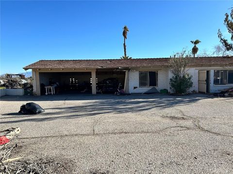 Photo of 20572 Rancherias Rd, Apple Valley, CA 92307 (MLS # GD26039647)