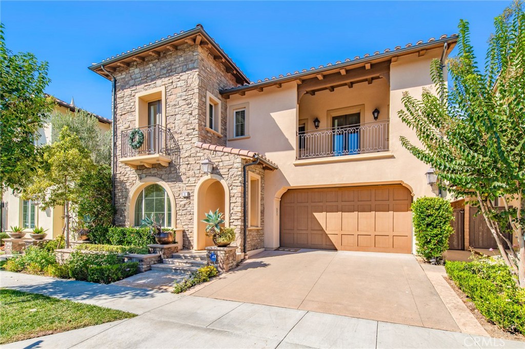 BEST DEAL EVER!!! Set in the esteemed Guard Gated Groves community of Orchard Hills, this exquisite 4-bedroom, 4.5-bathroom residence blends luxury with everyday comfort. Featuring a coveted main-floor bedroom suite and a versatile upstairs loft, every bedroom includes its own private bath.
The home welcomes you with an elegant entry that opens to a spacious great room featuring a cozy fireplace and an expansive dining area—perfect for both entertaining and family living. The chef’s kitchen is a showpiece, equipped with a professional 6-burner range, oversized center island, and premium appliances, complemented by a fully functional prep kitchen with additional amenities. On the main floor, a private bedroom suite provides ideal accommodations for guests or extended family. Upstairs, the primary suite serves as a luxurious retreat with dual walk-in closets and a spa-like bathroom showcasing a soaking tub, separate shower, and dual vanities. Two additional ensuite bedrooms and a versatile loft—ideal as a family room, home office, or play area—complete the second level. A dedicated laundry room with ample storage enhances the home’s functionality. Step outside to the beautifully landscaped backyard creating the perfect setting for indoor-outdoor entertaining or quiet relaxation.
Residents of Orchard Hills enjoy resort-style amenities, including scenic trails, verdant parks, sparkling pools, and the community’s signature avocado groves. With convenient access to premier shopping, dining, top-rated schools, and major freeways, this exceptional property offers the ultimate Southern California lifestyle.