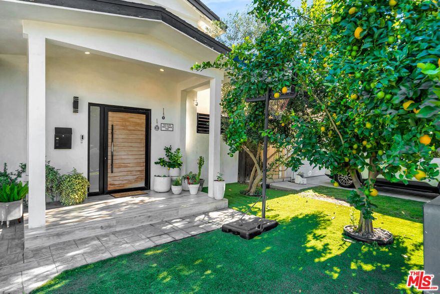 Beautifully remodeled with exceptional attention to detail, this stunning 5-bedroom, 3-bath Tarzana residence blends modern design, high-quality finishes, and effortless functionality. Bathed in natural light, the open-concept floor plan is enhanced by recessed lighting throughout, double-pane windows, and custom doors that showcase the home's thoughtful craftsmanship. The chef's kitchen serves as the centerpiece of the home, featuring high-end appliances, sleek cabinetry, premium countertops, and a spacious layout ideal for cooking and hosting. The living and dining areas flow seamlessly together, with sliding doors that open to the backyard and create the perfect environment for entertaining or everyday comfort. The private backyard oasis is designed for year-round enjoyment, offering a sparkling pool, inviting fire pit, low-maintenance artificial grass, a large covered patio, and a built-in BBQ perfect for weekend gatherings, outdoor dining, or relaxing poolside. Whether you're entertaining guests or unwinding at the end of the day, this outdoor space delivers both beauty and functionality. With meticulous upgrades and stylish finishes throughout, this home offers the perfect blend of sophistication, comfort, and indoor/outdoor living in the heart of Tarzana.