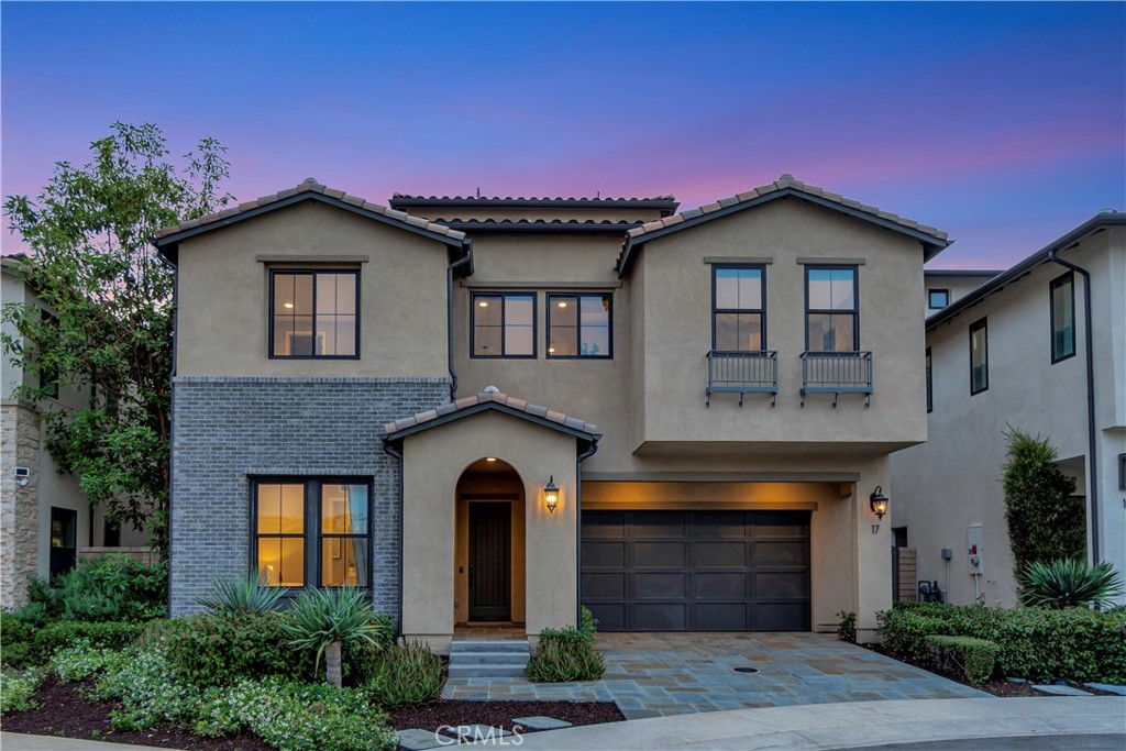 Luxury and sophistication await in this exquisite 4-bedroom, 6-bath model home, in the prestigious Teresina community of Lake Forest. Boasting 4,146 square feet, this plan 3X model offers stunning panoramic views and superior upgrades. Enter through the grand entryway with vaulted ceilings, setting the tone for unparalleled luxury. Upgraded hardwood flooring and LED lighting flow seamlessly throughout the home. The gourmet kitchen features granite and quartz countertops, full-height tile backsplash, and top-of-the-line GE Monogram appliances complete with a spacious pantry with built-in open storage shelving. The great room showcases elegant wall paneling, a limestone fireplace, and stacking sliding doors that open to reveal breathtaking views. The outdoor room, complete with ceiling fans and tongue and groove ceiling detail, is the perfect setting for outdoor dining and relaxation. The upscale backyard features a pergola with a built-in BBQ island, perfect for hosting unforgettable gatherings. The thoughtfully designed first floor also includes an open-layout dining room, powder room with a limestone countertop, a den with built-in lighted cabinets and shelving, and a convenient bedroom with an attached bathroom featuring a quartz countertop. The second floor is home to the luxurious primary suite, offering sweeping views and a private covered terrace with equally captivating vistas. The primary linen suite features a quartzite countertop, tile backsplash, and a GE Monogram wine chiller. Indulge in the primary bathroom, complete with quartzite countertops, floor-to-ceiling shower tiling, and a soothing rain can shower head. A large walk-in closet provides ample storage. The laundry room boasts white shaker cabinets and quartz countertops. The versatile loft space includes a wall-mounted TV pre-wire and charming tongue and groove wall detail. Two additional bedrooms, each with an attached upgraded bathroom, complete the second level. Ascend to the third story bonus room featuring a convenient kitchenette, white shaker cabinets, a granite countertop with waterfall edge, and a powder room. From here, Step out onto the incredible roof terrace, where you will be mesmerized by unbelievable views. The 2 car garage offers a tank less water heater, epoxy flooring, and conduit for EV charging. This model home is a true testament to luxury living, offering an unparalleled blend of sophisticated design, premium upgrades, and breathtaking views.