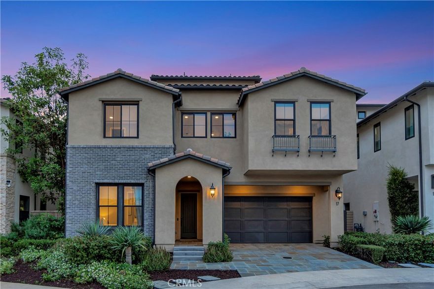 Luxury and sophistication await in this exquisite 4-bedroom, 6-bath model home, in the prestigious Teresina community of Lake Forest. Boasting 4,146 square feet, this plan 3X model offers stunning panoramic views and superior upgrades. Enter through the grand entryway with vaulted ceilings, setting the tone for unparalleled luxury. Upgraded hardwood flooring and LED lighting flow seamlessly throughout the home. The gourmet kitchen features granite and quartz countertops, full-height tile backsplash, and top-of-the-line GE Monogram appliances complete with a spacious pantry with built-in open storage shelving. The great room showcases elegant wall paneling, a limestone fireplace, and stacking sliding doors that open to reveal breathtaking views. The outdoor room, complete with ceiling fans and tongue and groove ceiling detail, is the perfect setting for outdoor dining and relaxation. The upscale backyard features a pergola with a built-in BBQ island, perfect for hosting unforgettable gatherings. The thoughtfully designed first floor also includes an open-layout dining room, powder room with a limestone countertop, a den with built-in lighted cabinets and shelving, and a convenient bedroom with an attached bathroom featuring a quartz countertop. The second floor is home to the luxurious primary suite, offering sweeping views and a private covered terrace with equally captivating vistas. The primary linen suite features a quartzite countertop, tile backsplash, and a GE Monogram wine chiller. Indulge in the primary bathroom, complete with quartzite countertops, floor-to-ceiling shower tiling, and a soothing rain can shower head. A large walk-in closet provides ample storage. The laundry room boasts white shaker cabinets and quartz countertops. The versatile loft space includes a wall-mounted TV pre-wire and charming tongue and groove wall detail. Two additional bedrooms, each with an attached upgraded bathroom, complete the second level. Ascend to the third story bonus room featuring a convenient kitchenette, white shaker cabinets, a granite countertop with waterfall edge, and a powder room. From here, Step out onto the incredible roof terrace, where you will be mesmerized by unbelievable views. The 2 car garage offers a tank less water heater, epoxy flooring, and conduit for EV charging. This model home is a true testament to luxury living, offering an unparalleled blend of sophisticated design, premium upgrades, and breathtaking views.