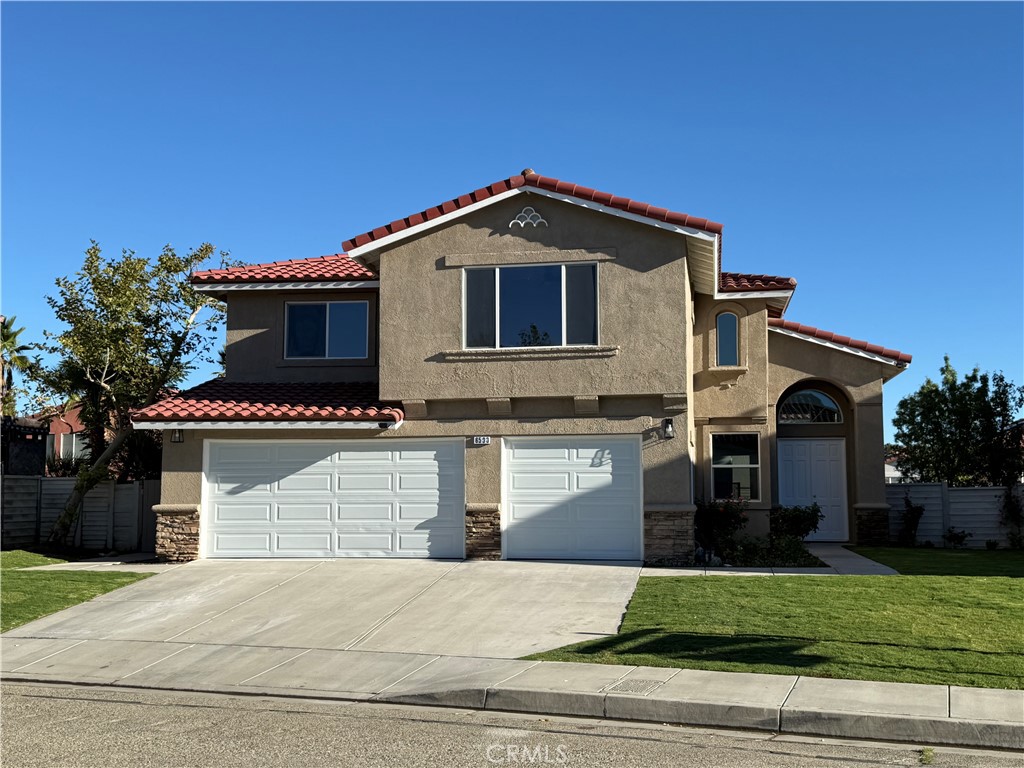 Big Westside 2-Story Pool Home in Monterey Collection by Barrett Homes! C Elevation with Rock Accents! 4 BR + Den + 3 Baths. 2504 SF. Built in 1999. Tile Roof. Stucco Exterior. Wood Trim. 3-Car Garage. Roll-up Doors. Exterior Lighting. Lush Front Lawn and Rose Gsrden. 8-Foot Double Entry Doors! High Ceiling. LR/DR Combo. Clerestory Windows. Impressive Staircase with Wrought-Iron Railing. Custom Interior Paint. Luxury Vinyl Plank Flooring. Upgraded Baseboards. Office/Den with Recessed Lighting. Digital Thermostat. Dual-Paned Windows. Guest Bath is SOT with Quartz Counter and Rain Forest Shower Head. Indoor Laundry. Huge Kitchen with 9-Foot Ceiling. Recessed Lights. White Cabinets. Quartz Counters with Waterfall. Long Buffet Table. Decora Paddles. Family Room with Fireplace and TV Cutout. 8-Foot Slider to Rear. Upstairs Double Door Primary Suite with TV Cutout and Walk-in Closet. Primary Bath has Double Sinks, Oval Tub and Separate Shower. Tile Floor. 2 More Bedrooms with Ceiling Fans and Closets. 4th BR is Gigantic Open Bonus Room with Recessed Lighting. EZ Maintenance Backyard has Free-Standing Patio Cover with Built-in BBQ. In-Ground Pool and Spa! Lots of Flashburn Brick! Woodcrete Fences!