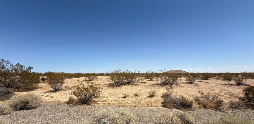 Welcome to beautiful California city in this secluded area you find a beautiful parcel of land ready to be built upon zoned for residential use. A big beautiful spacious corner lot with houses already nearby.