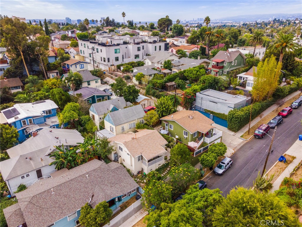 Welcome to 2210 Scott Avenue, a hidden gem nestled in the heart of Los Angeles. This 2-bedroom, 1-bathroom home offers breathtaking city views and sits on a peaceful street just minutes from everything Echo Park has to offer trendy cafes, shops, and parks.The property features a spacious basement with great potential for expansion or additional living space, along with a front yard filled with mature mango and other fruit trees a rare find in the city!
Whether you’re looking to update, expand, or simply enjoy as-is, this home is the perfect opportunity to create your own urban oasis while staying close to DTLA, Silver Lake, and major freeways. Don’t miss this opportunity to own a piece of Echo Park charm with incredible potential and unbeatable location!