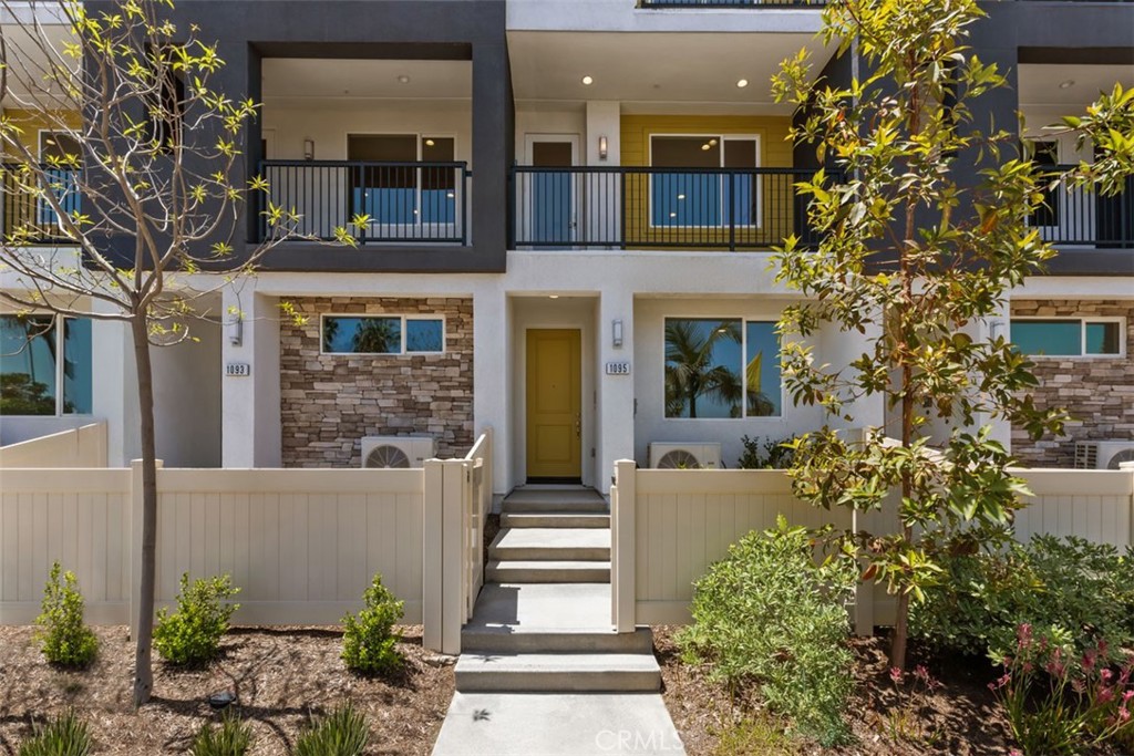 Experience modern living in this stunning, three-story home, which showcases an open floor plan with 9-ft. ceilings and luxury vinyl plank flooring at main living areas. Upstairs, the kitchen boasts thermofoil cabinets, quartz countertops, full backsplash and Samsung® stainless steel appliances. The third-floor primary bedroom features plush carpeting and a large walk-in closet. Additional highlights of this all-electric home include a solar energy system, LED lighting, electric charging station pre-wiring and smart thermostat.
Conveniently located to I- 5, Hwy 91, and Hwy 57. Close to Disneyland, Knotts Berry Farm, and near Cal State Fullerton