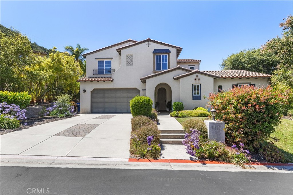 Welcome to 1960 Estrella Court! This stunning semi-custom home in Prefumo Creek Estates offers 4 bedrooms, 4.5 bathrooms, and 3,407± sq ft of living space on a 0.24± acre corner lot. The open-concept floor plan features hardwood floors, travertine tile, high ceilings, and upgraded cabinetry throughout. The main level includes a primary suite with walk-in closet and en-suite bath, a spacious living room with gas fireplace and two-story ceiling, gourmet kitchen with granite countertops, island, pantry, wine fridge, and built-in KitchenAid refrigerator, plus a laundry room with ample storage.
Upstairs you'll find a second oversized primary suite, two additional bedrooms with en-suite baths, a large bonus/flex room, and a built-in workstation. Both primary suites feature dual vanities, soaking tubs, and separate showers.
The low-maintenance backyard includes mature landscaping, extended patio, and water-efficient drip irrigation. Additional features: 3-car garage, Ring doorbell, alarm system, and updated exterior lighting. Located on a quiet cul-de-sac in the Irish Hills, close to downtown, shopping, dining, parks, schools, SLO Airport, and Hwy 101. A rare opportunity to enjoy luxury and space in one of San Luis Obispo’s most sought-after communities.