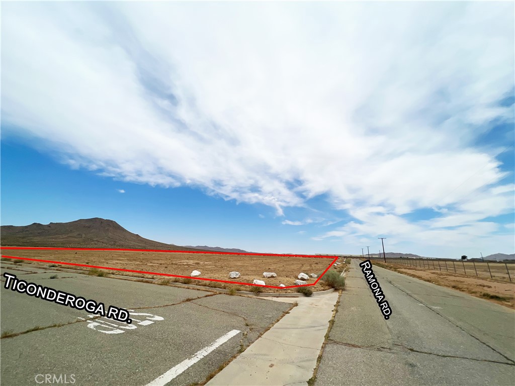 ±5.35 acre vacant land parcel within the North Apple Valley Industrial Specific Plan – rectangular in shape, roughly 607 feet by 364 feet. Surrounded by paved road with curb and gutter. Electric service runs in Ramona Rd along the eastern side of the parcel as well as in Ticonderoga Rd at the southern edge of the parcel. Sewer as well as water runs in Ramona Rd adjacent to the east of the site. Walmart DC and the former Big Lots DC just one mile to the north of this site. 1.2 million sqft ARCO / Lecangs project is coming out of the ground now just over a mile north. Millions of additional square feet of Industrial space in some stage of entitlement or planning in the immediate area. Brightline high speed train station planned for Dale Evans Pkwy & I-15 less than five miles north of the site. This is the hot bed of industrial activity they’ve been talking about.