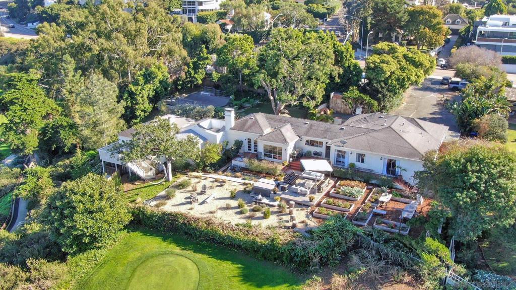 Build your Dream Home and Guest House on this nearly 1-acre property with stunning frontage and sweeping views of La Jolla Country Club and beautiful ocean views. Or, simply update and enjoy the current single-level home. As one of the largest lots in West Muirlands, the property features expansive front, side and back yards and multiple garden areas; perfect for families and those wanting to be enveloped by spectacular mature trees, endless lush greenery and front-row seating for stunning sunsets. Views are found all around. Ideally located near some of La Jolla’s finest schools and famed Windansea Beach.