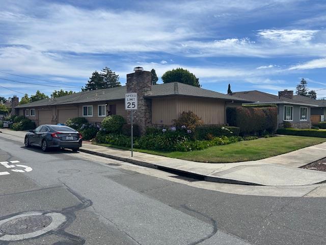 This an absolutely fabulous duplex home. All rooms are very spacious, very nice back yard, two car garage, walk to downtown and Central Park. Lots of curb appeal. Great school district! Don't miss!